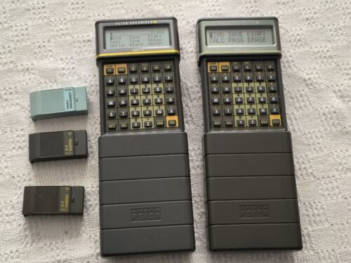 2 x Vintage Psion Organiser II (2) LZ and CM with 2 x Datapaks, 2 x Rampaks, Software and Case 32K 64K